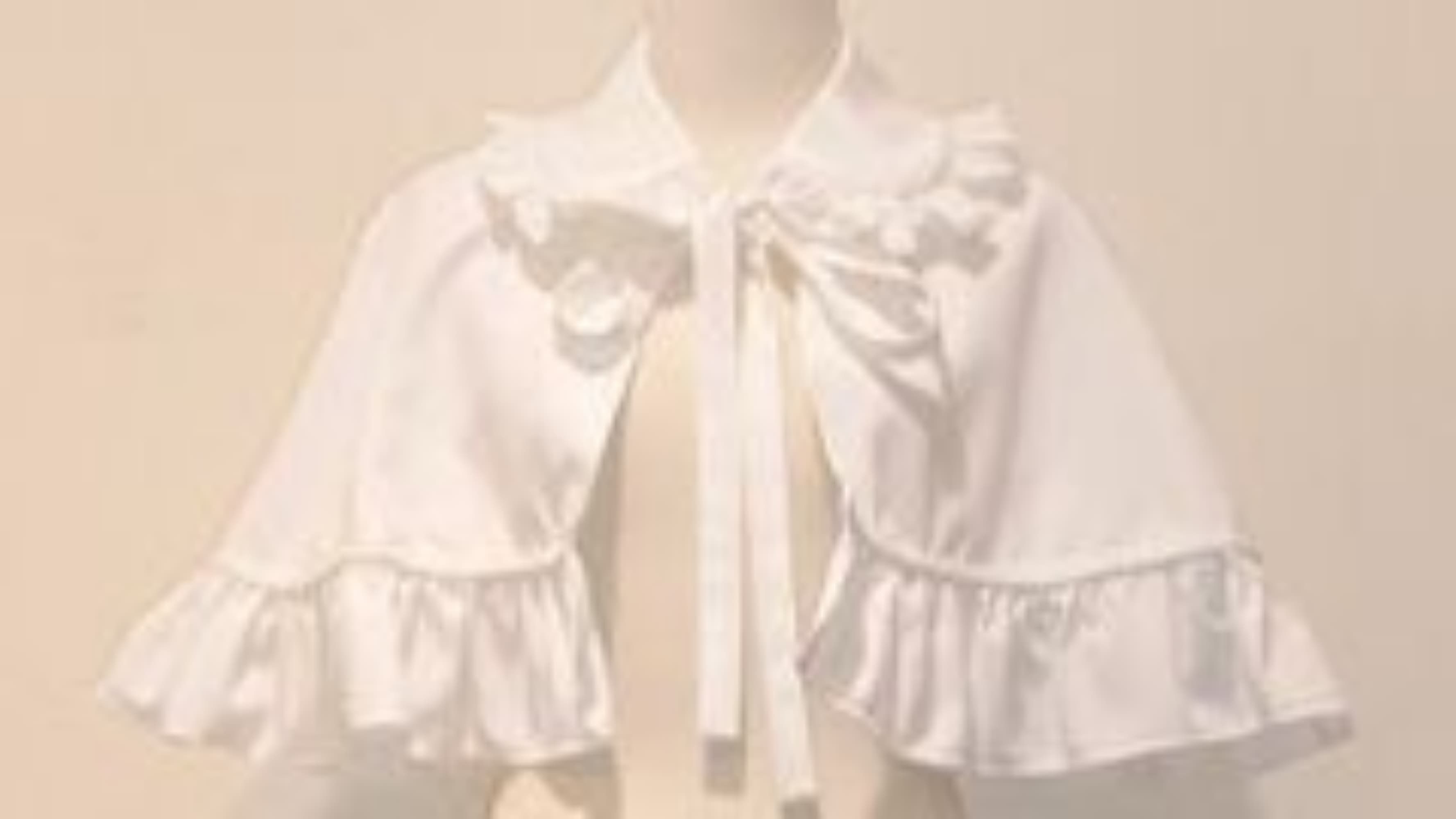 A coat / jacket / cape